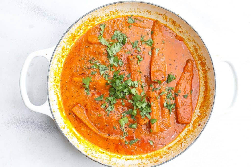 carrot curry in white pan