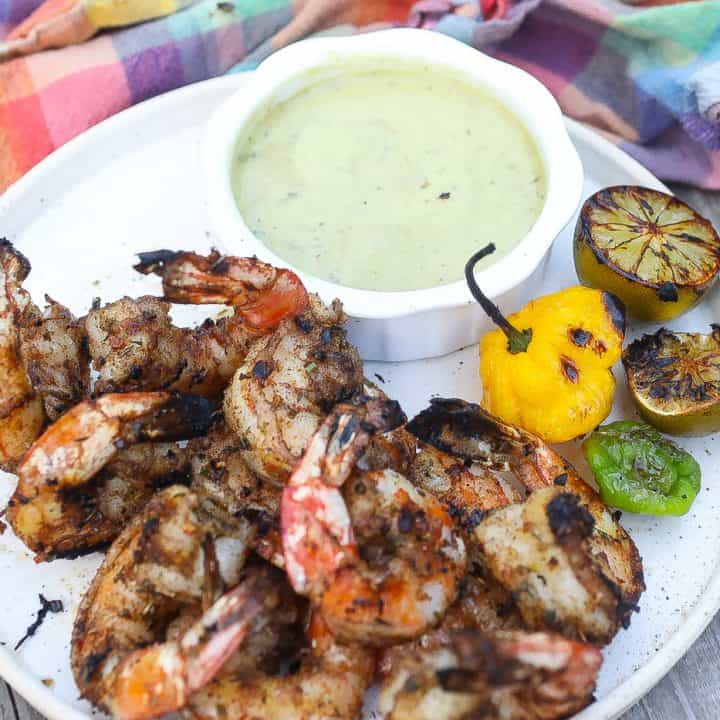 grilled jerk shrimp on white plate