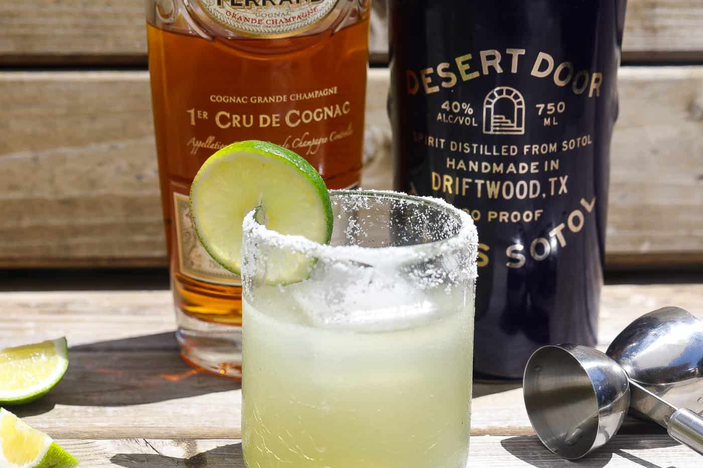 margarita on the rocks with two bottles