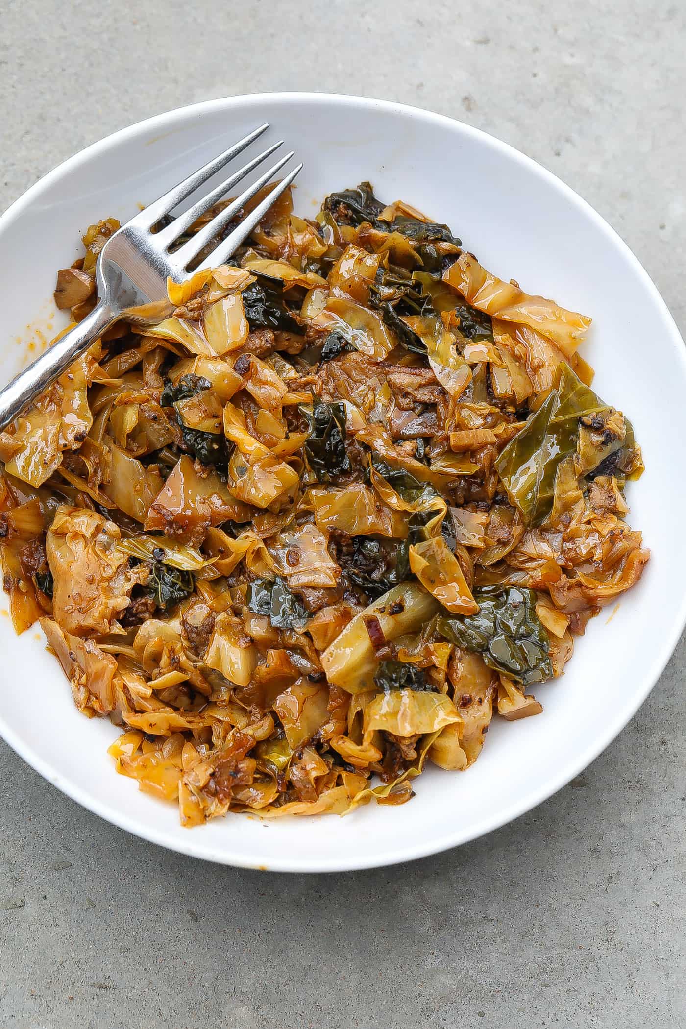 braised cabbage in a white bowl