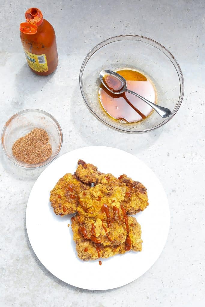 fried chicken thighs on white plate