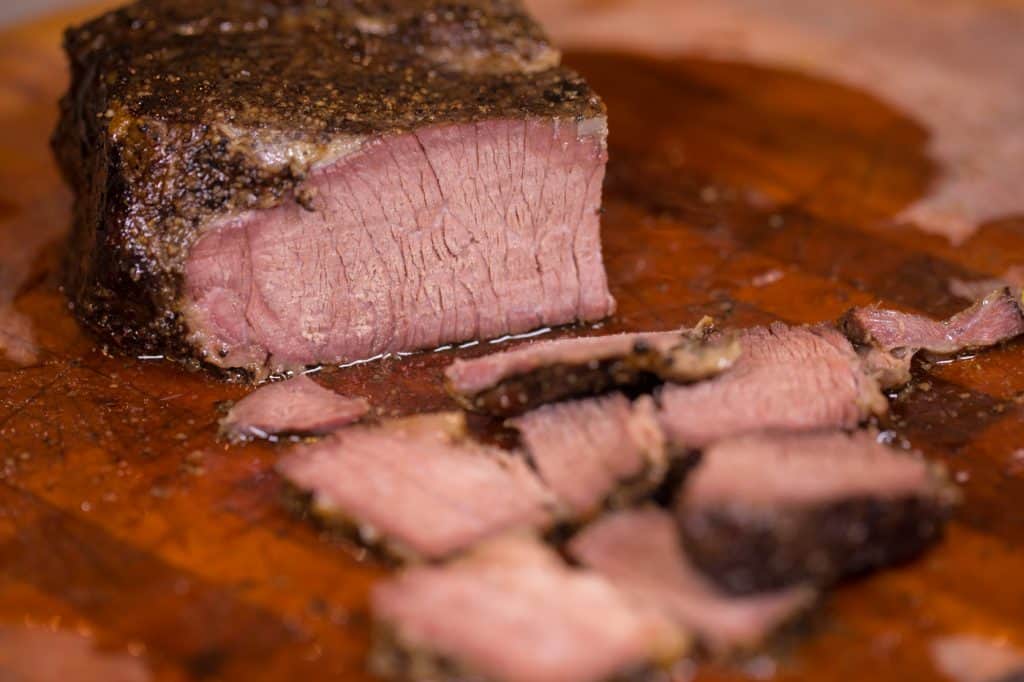 smoked chuck roast on a cutting board