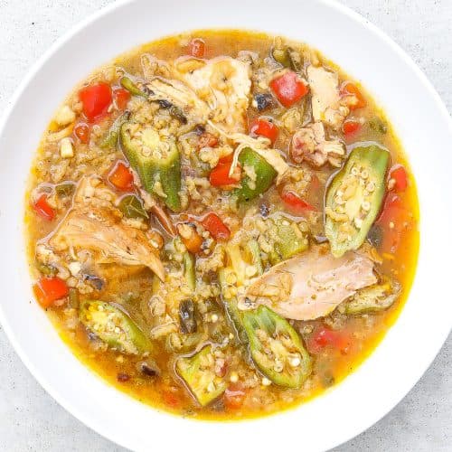 chicken and okra soup in a white bowl