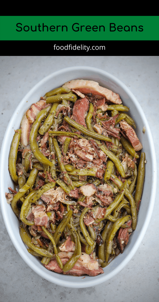 green beans and bacon in white oval bowl
