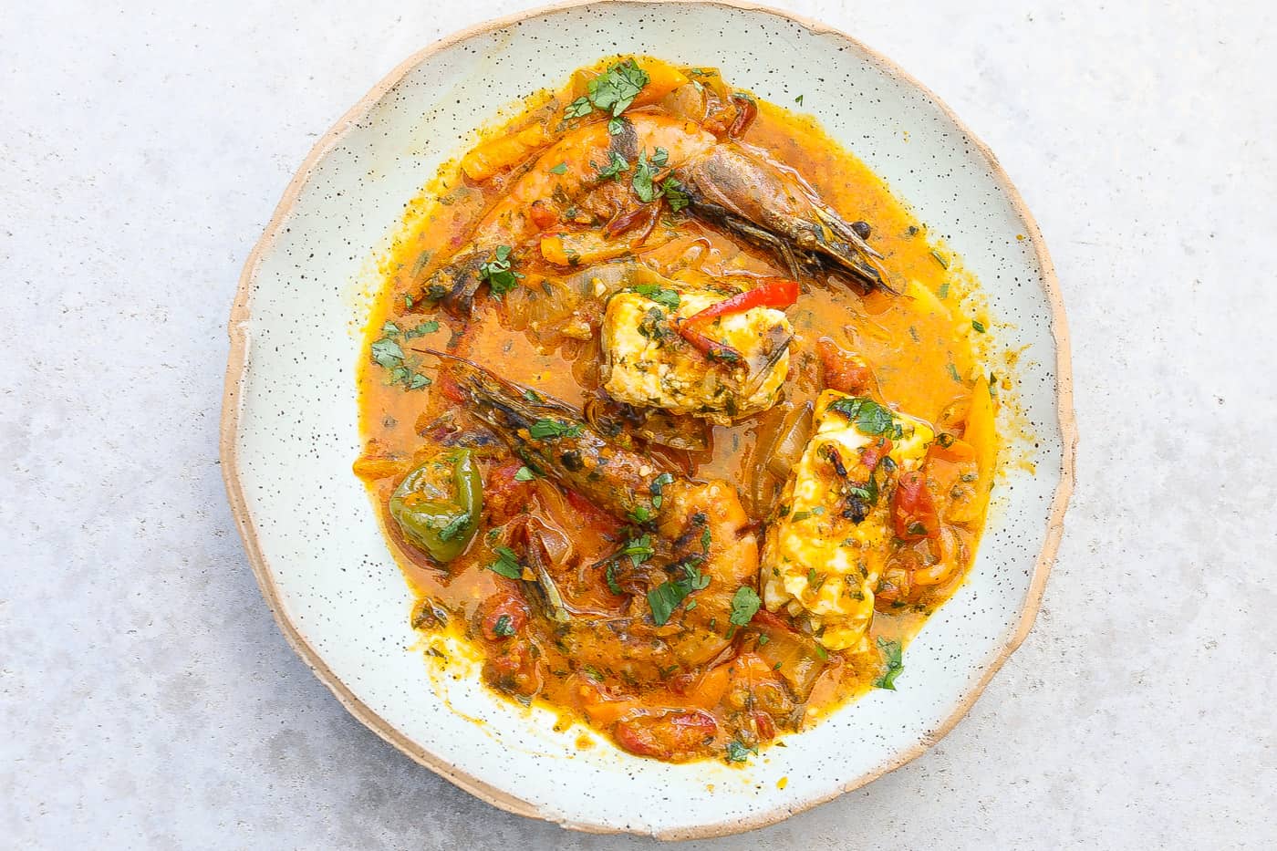 brazilian fish stew (moqueca baiana) in a bowl