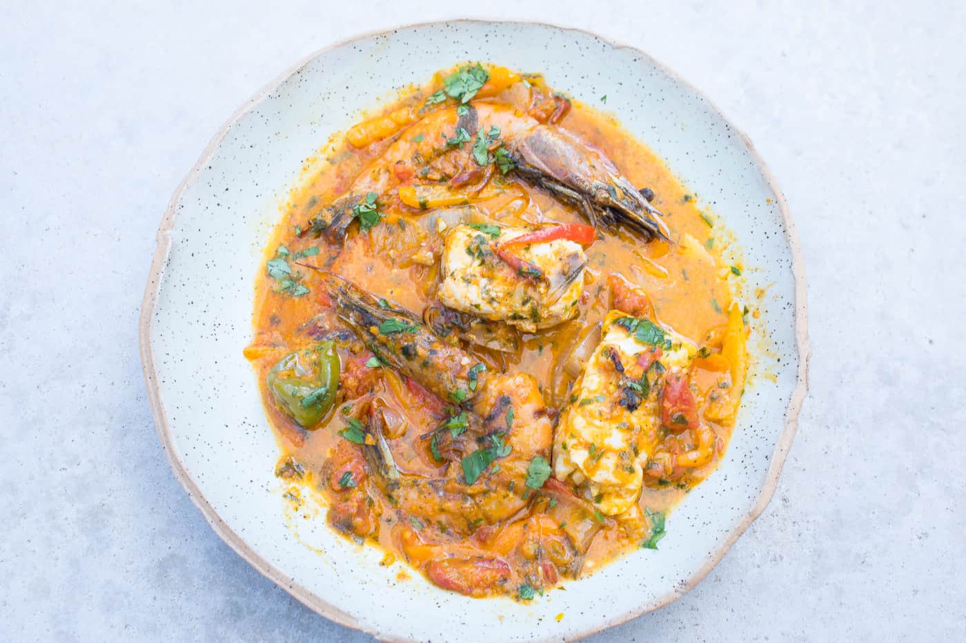 brazilian fish stew (moqueca baiana) in a bowl