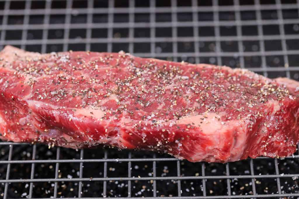 denver steak seasoned with salt and pepper