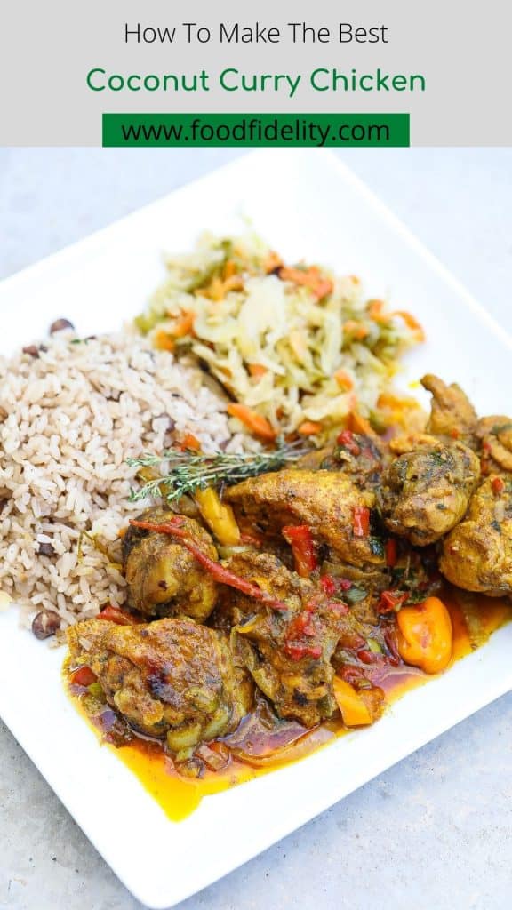 coconut curry chicken with rice and cabbage on white plate