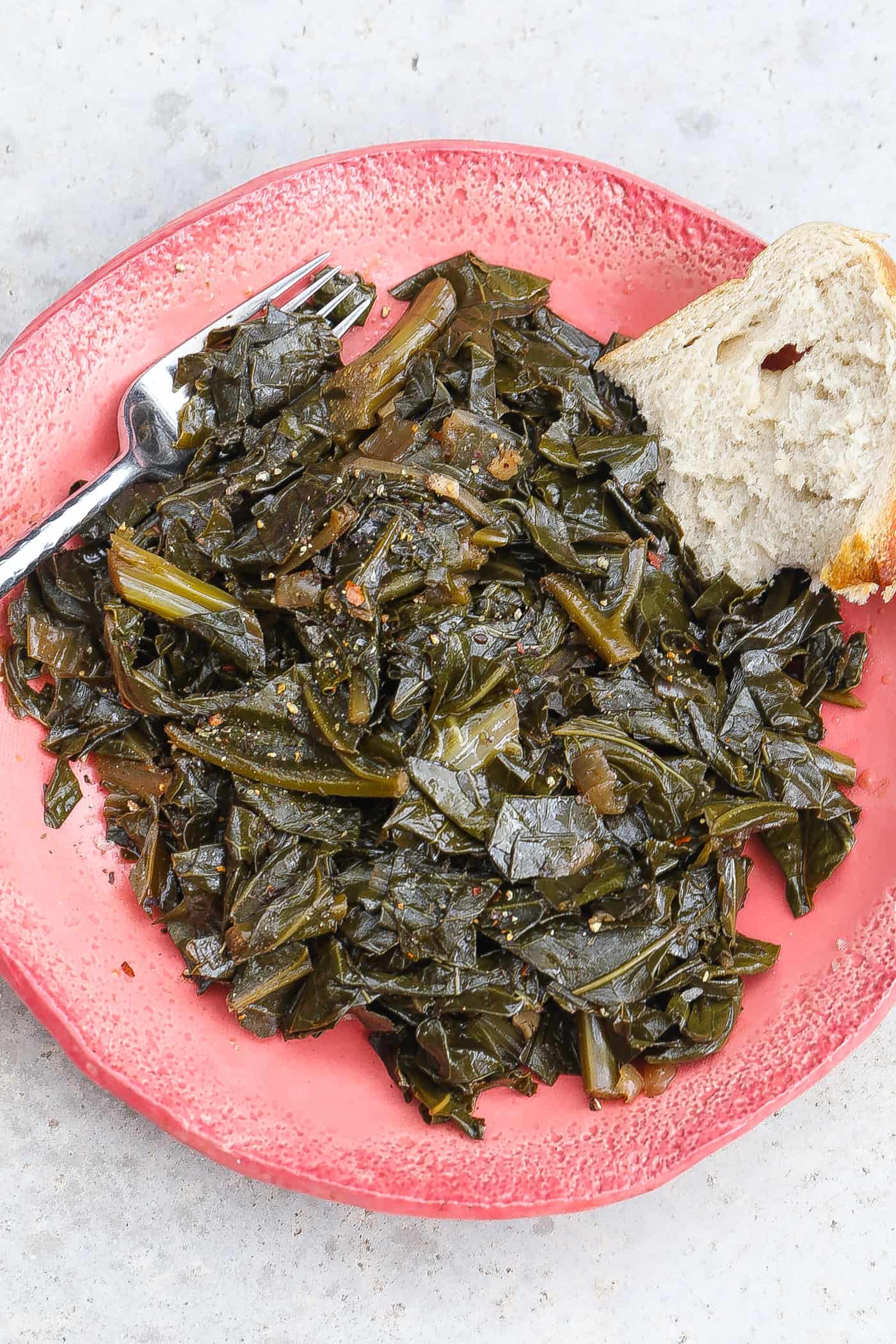 collard greens on a pink plate