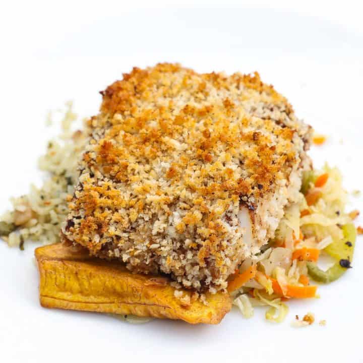 cod with panko crust on top of cabbage and plantains