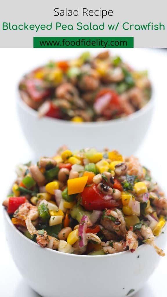 tortilla chips and black eyed salad in a white bowl