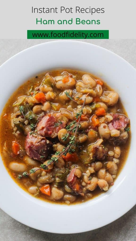 ham and beans soup in a white bowl
