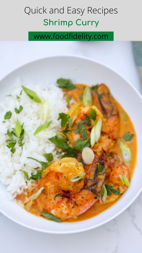 curry shrimp in a white bowl with white rice