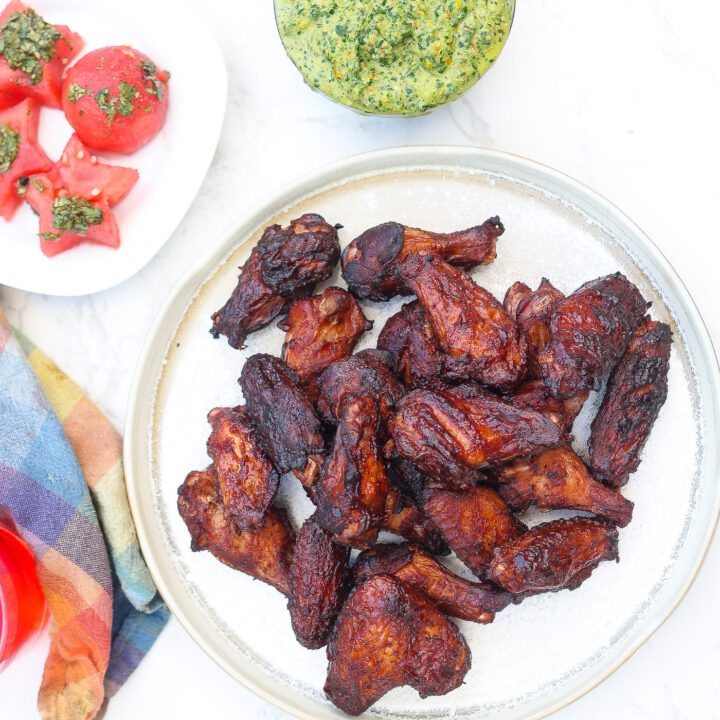 smoked chicken wings on white plate