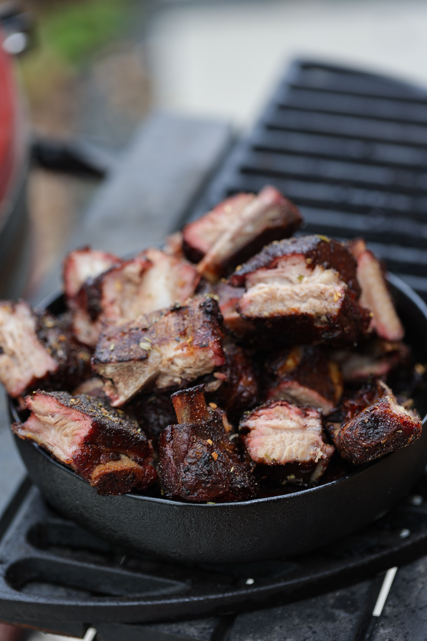 smoked rib tips piled in a black bowl