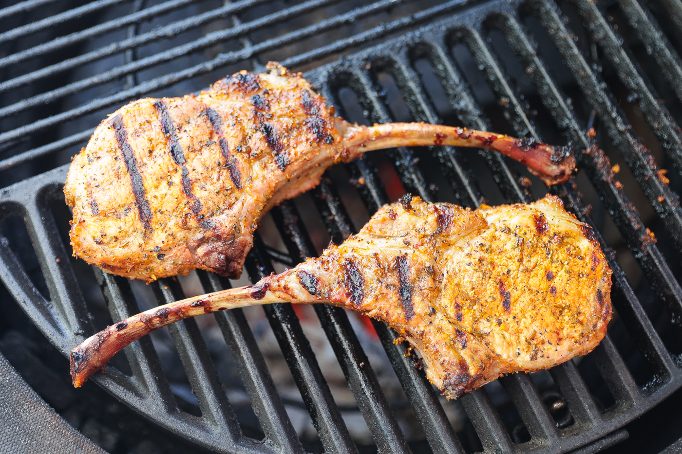 grilled tomahawk pork chop ongrill grate