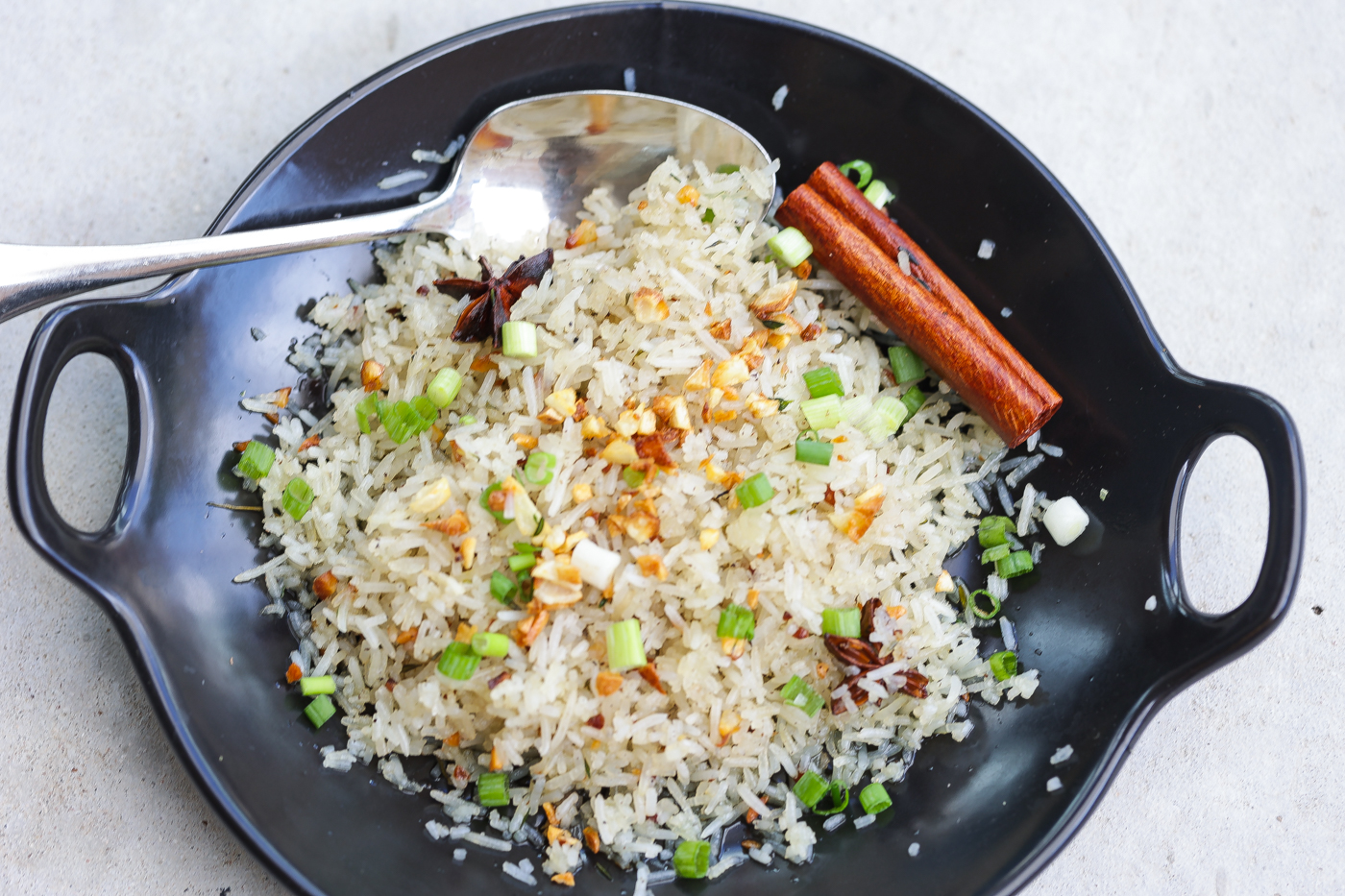 Garlic fried rice in black bowl