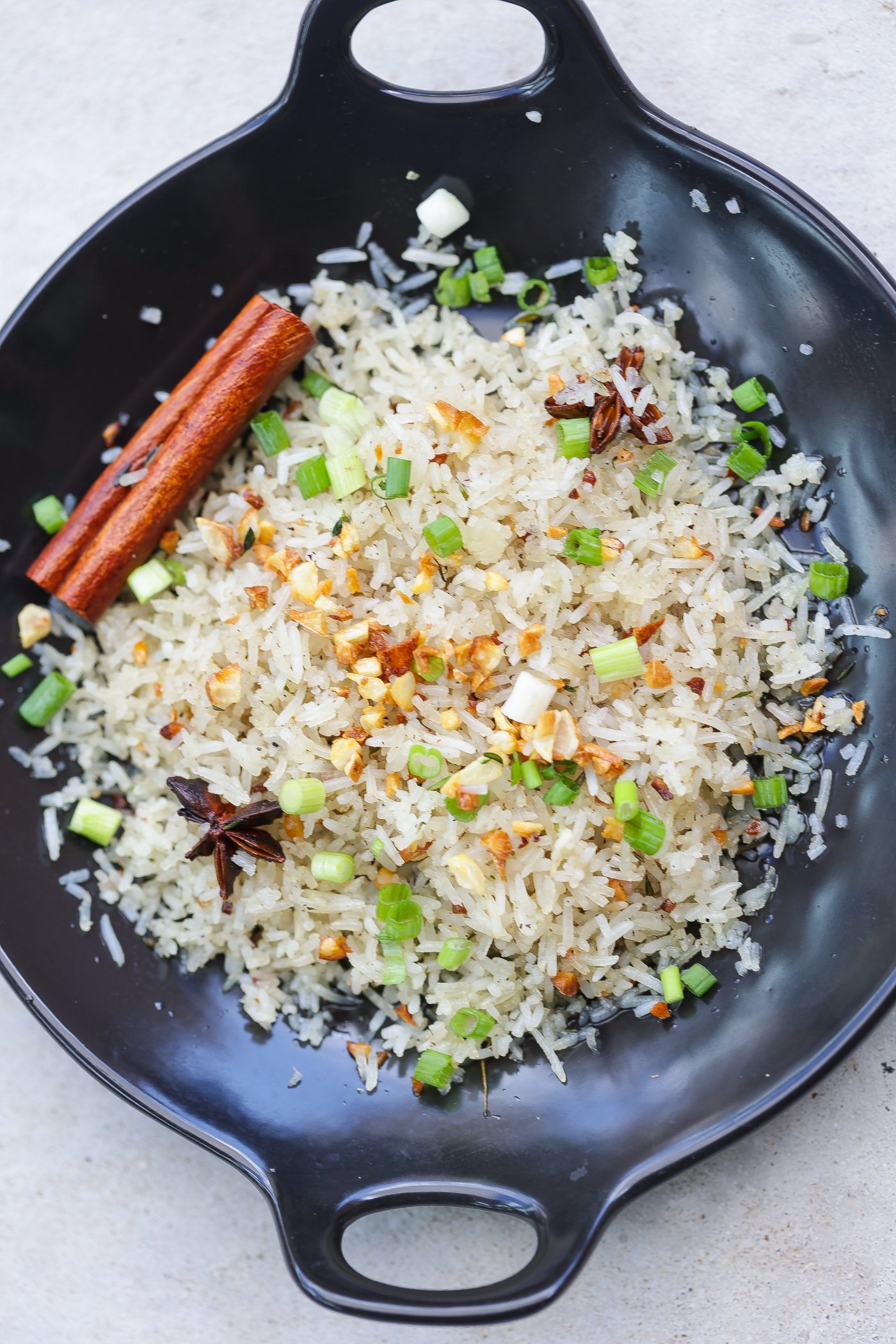 Garlic fried rice in black bowl