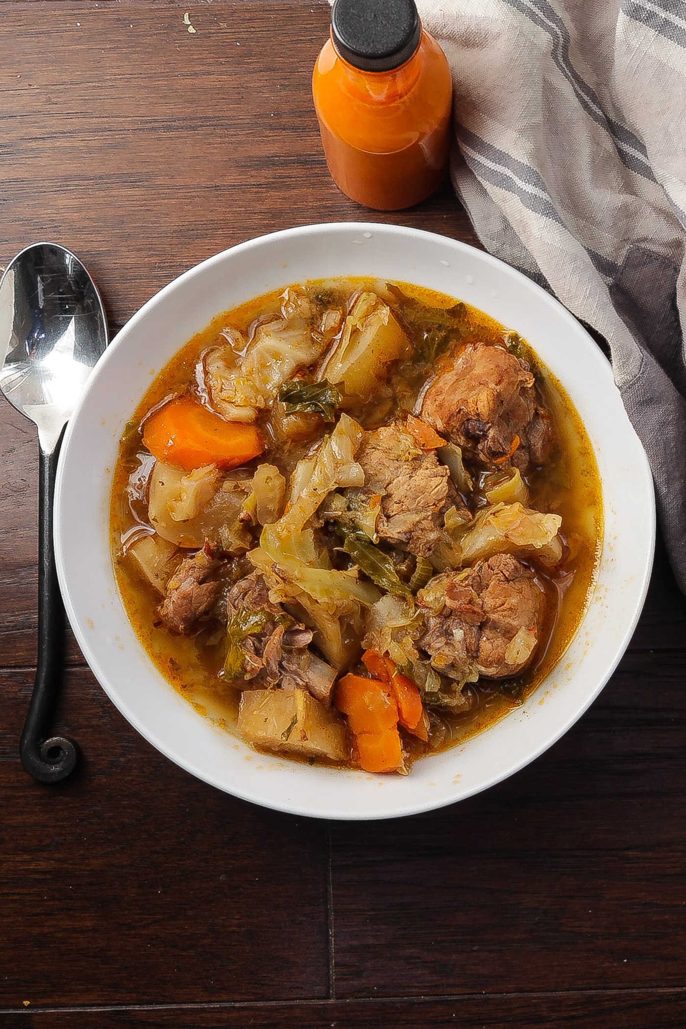 pork stew in a white bowl