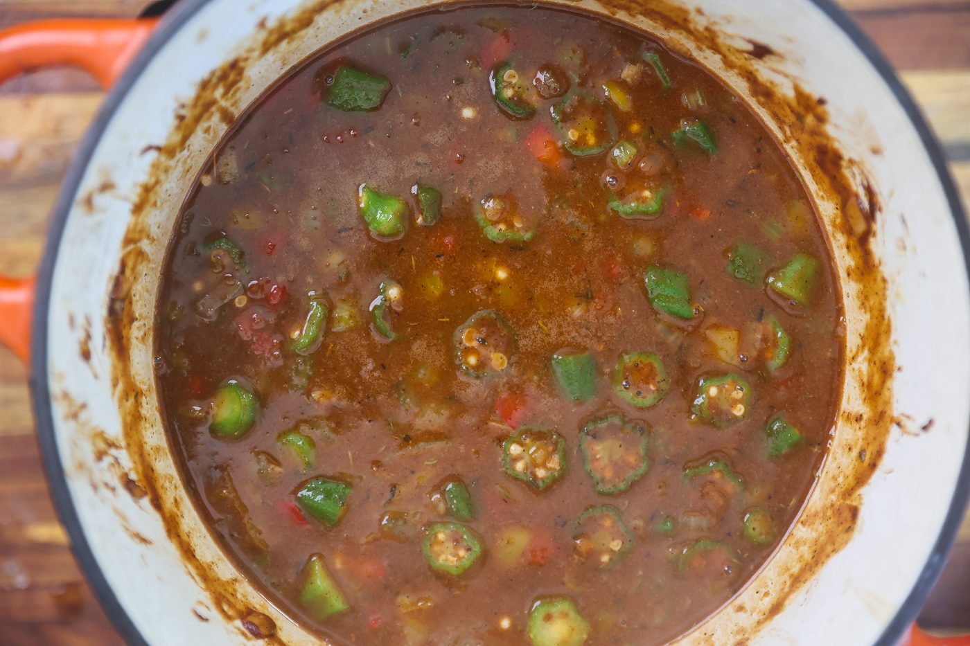 louisiana gumbo base with okra cooking in pot