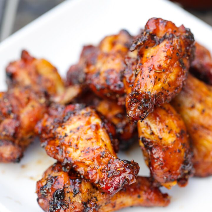 grilled chicken wings on white plate