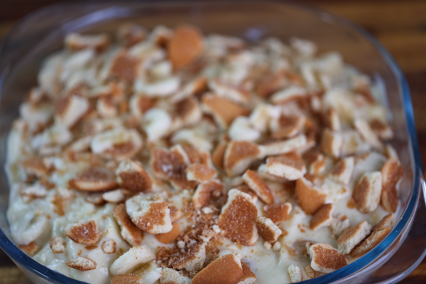 Old fashioned banana pudding layered in glass bowl