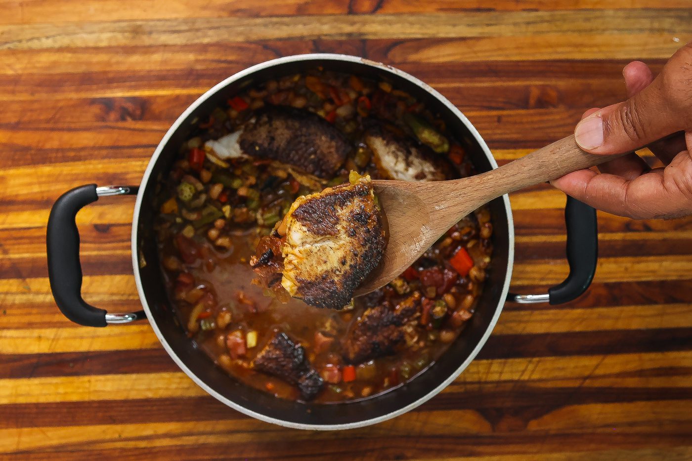 blackened catfish on a large spoon