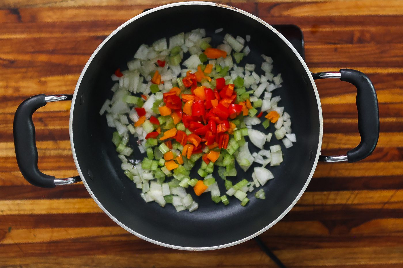 vegetables sauteing in pan