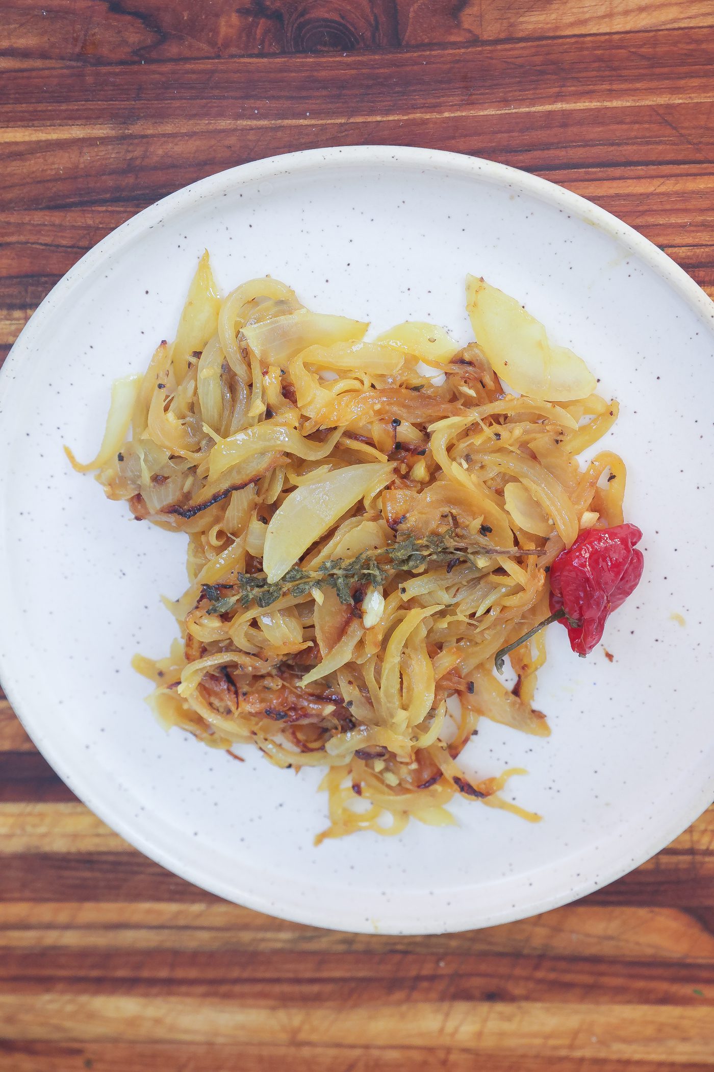 yassa onions on a white plate