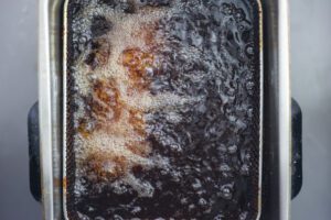 swordfish frying in oil