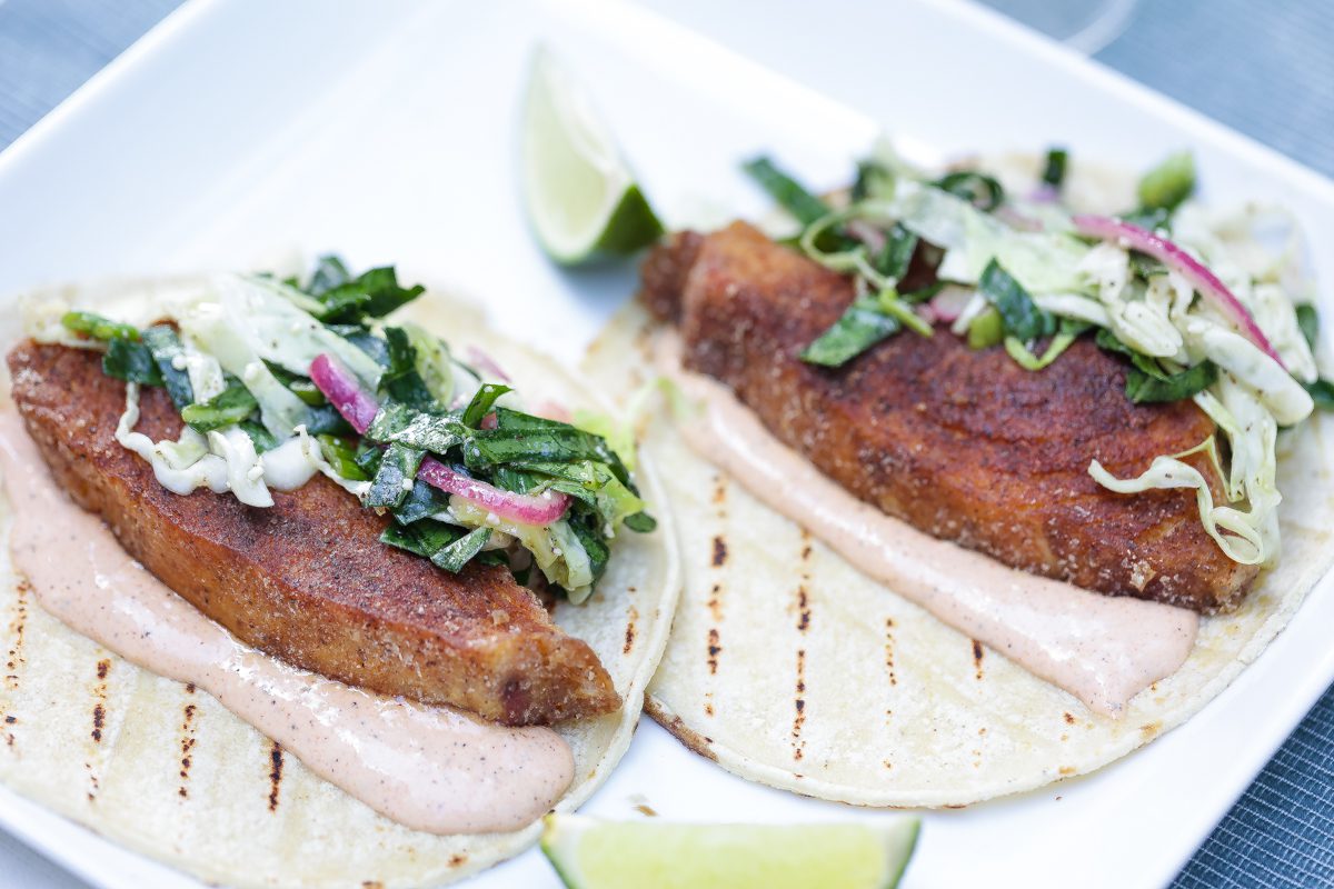 baja fish tacos on a white plate