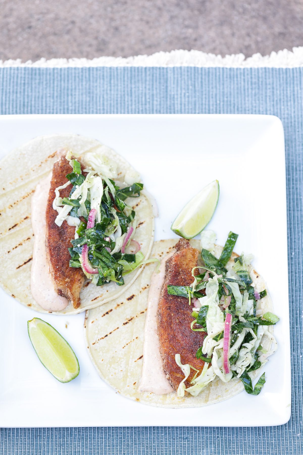 baja fish tacos on a white plate