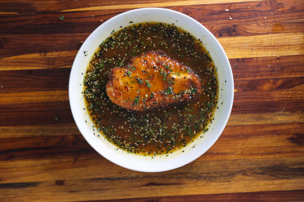 fried panko chicken breast in orange sauce