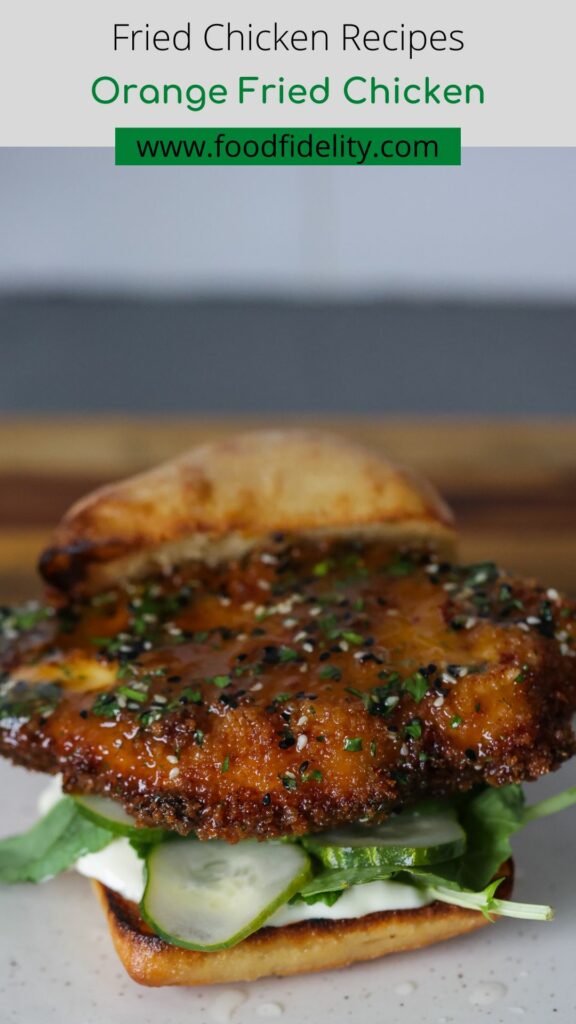 orange chicken sandwich on tray