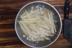 washing raw french fries