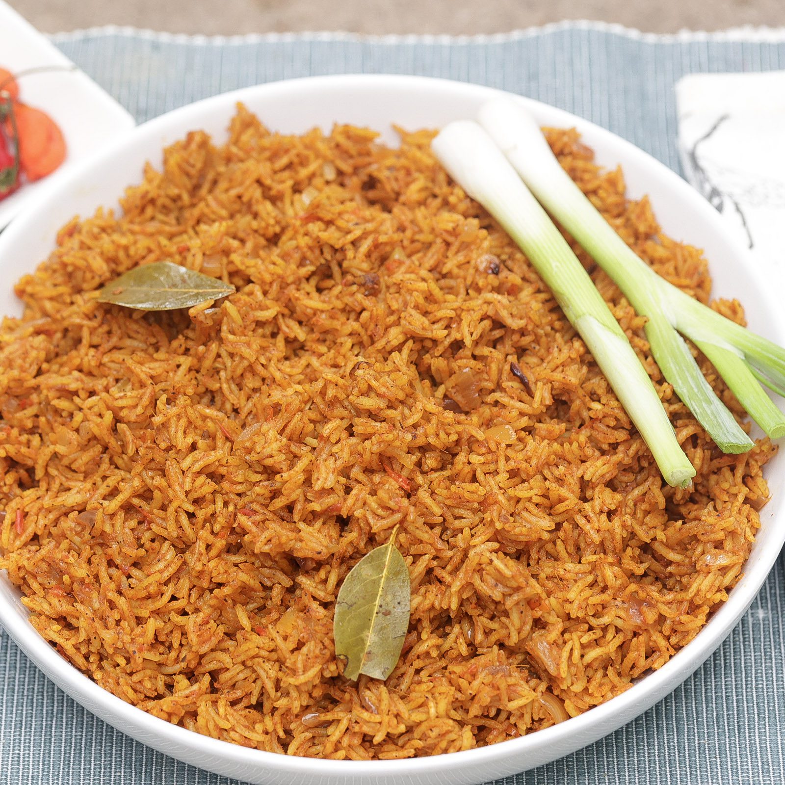 nigerian jollof rice in a white bowl