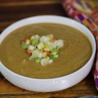 butternut squash soup in a white bowl