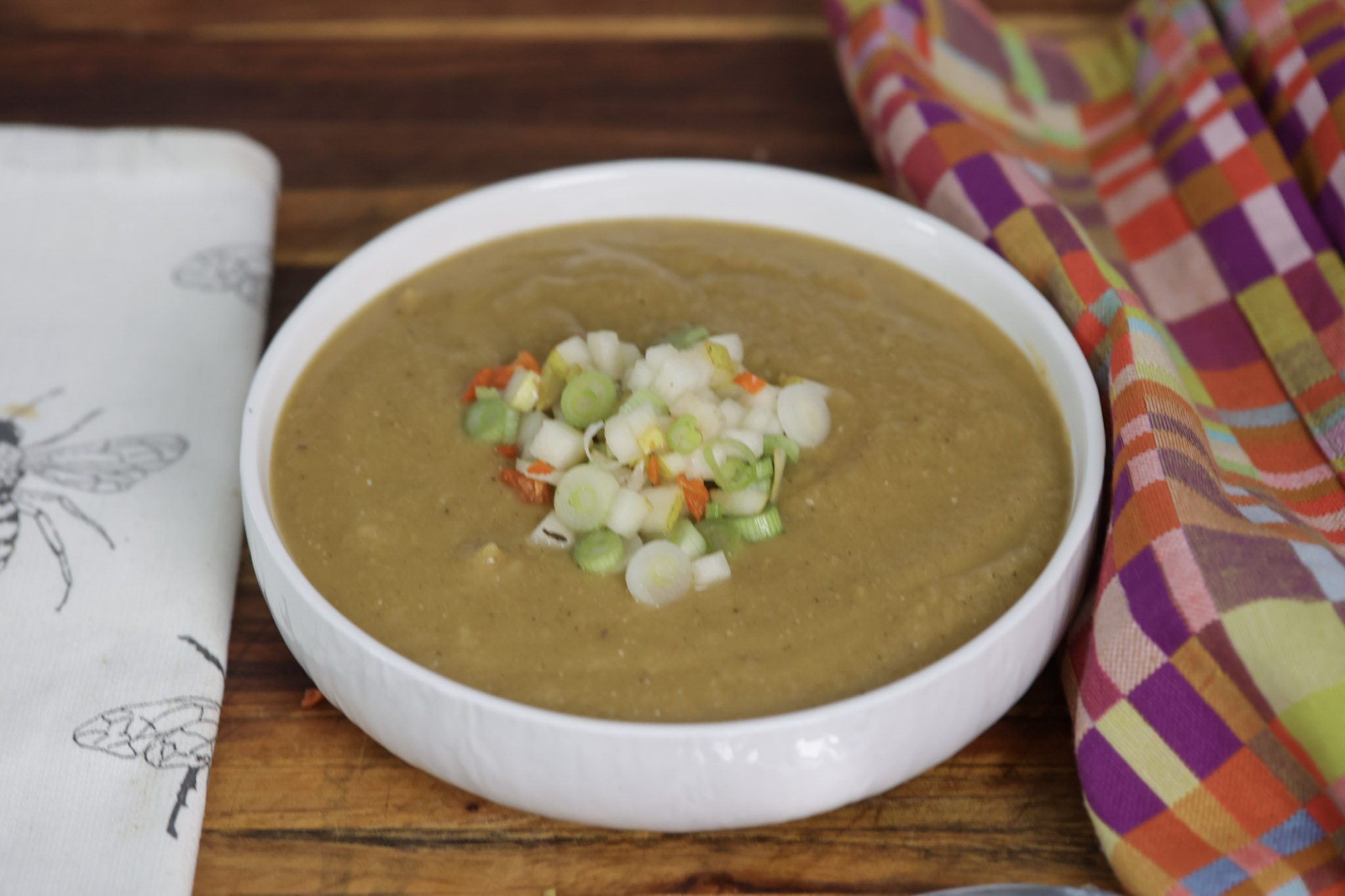 butternut squash soup in a white bowl