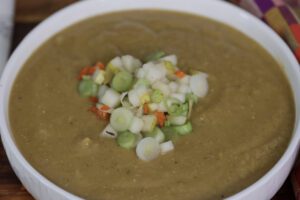 butternut squash soup in a white bowl