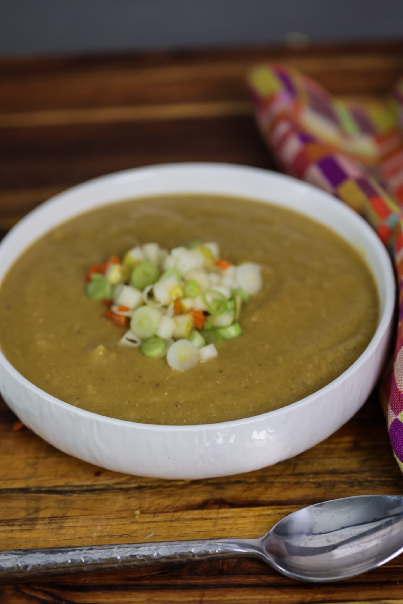 butternut squash soup in a white bowl