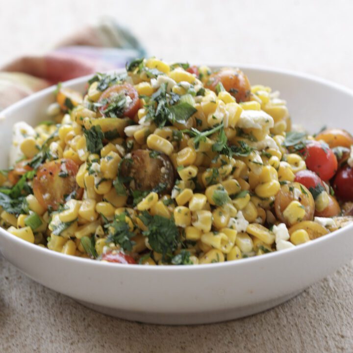 corn salad in white bowl