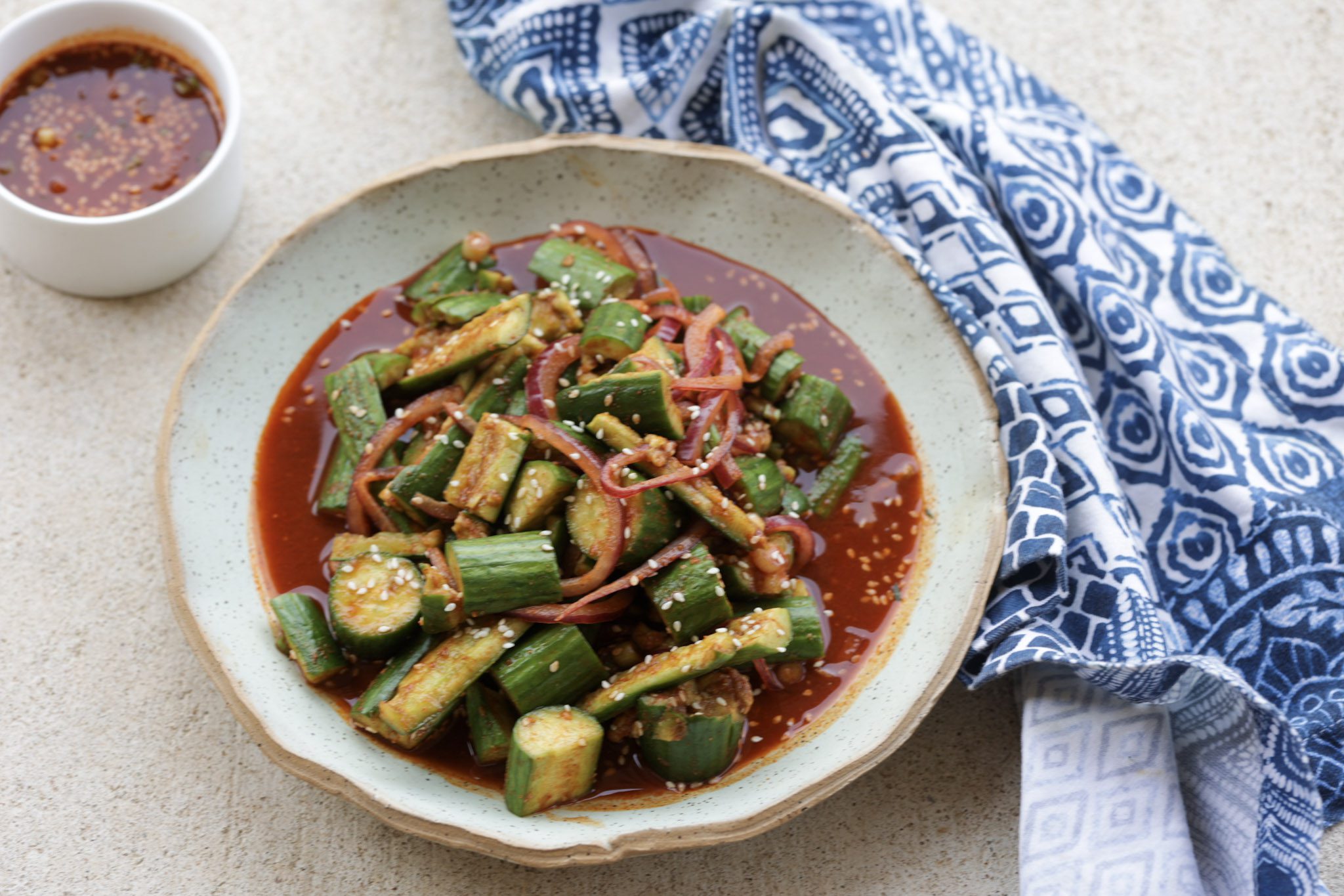 spicy cucumber with asian sauce in bowl