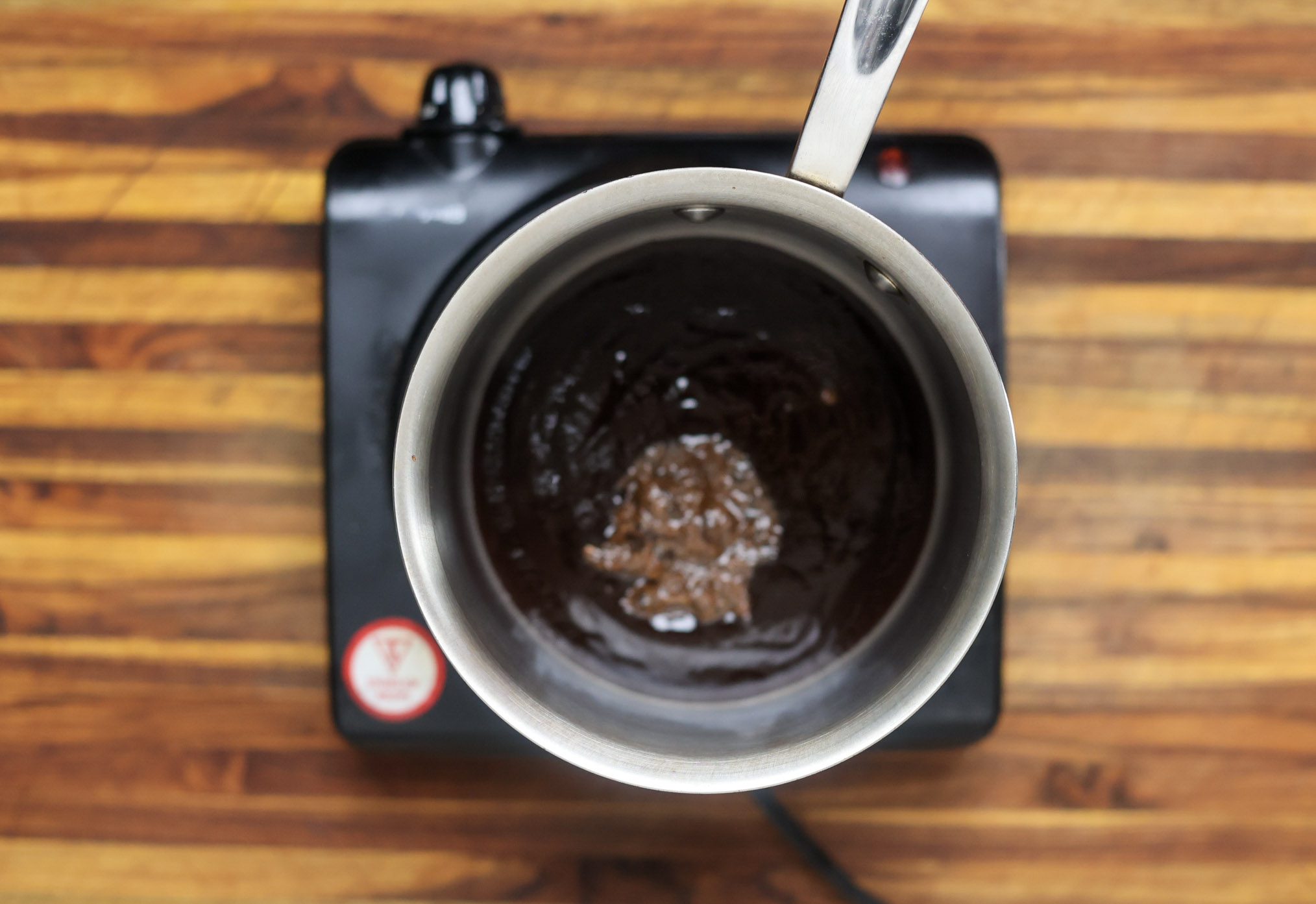 jerk bbq sauce cooking in saucepan