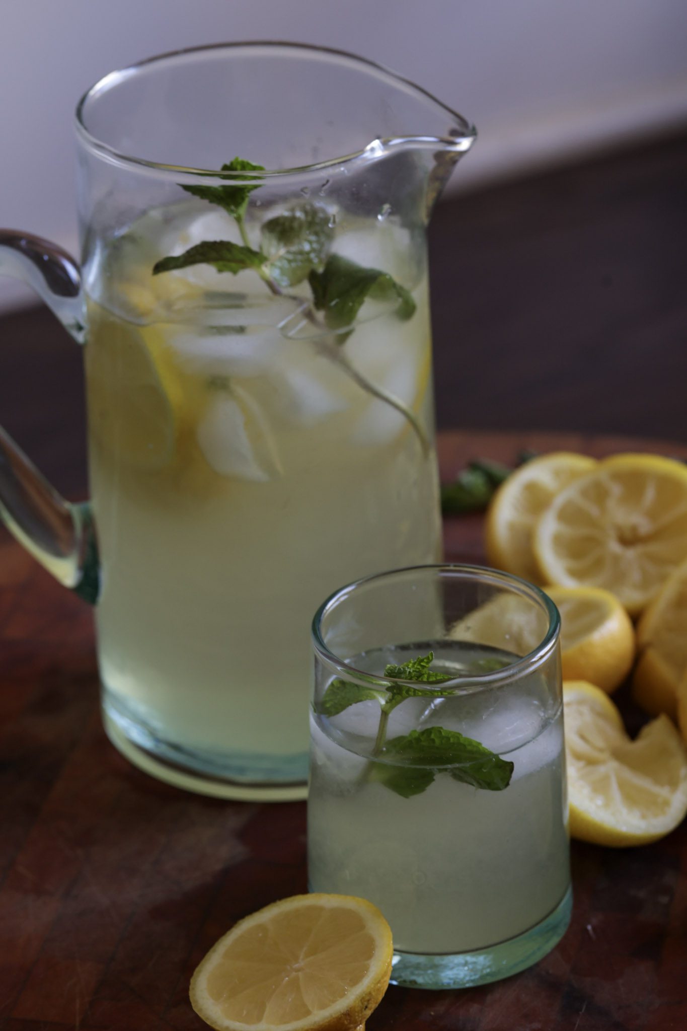 Haitian lemonade with fresh mint in a pitcher