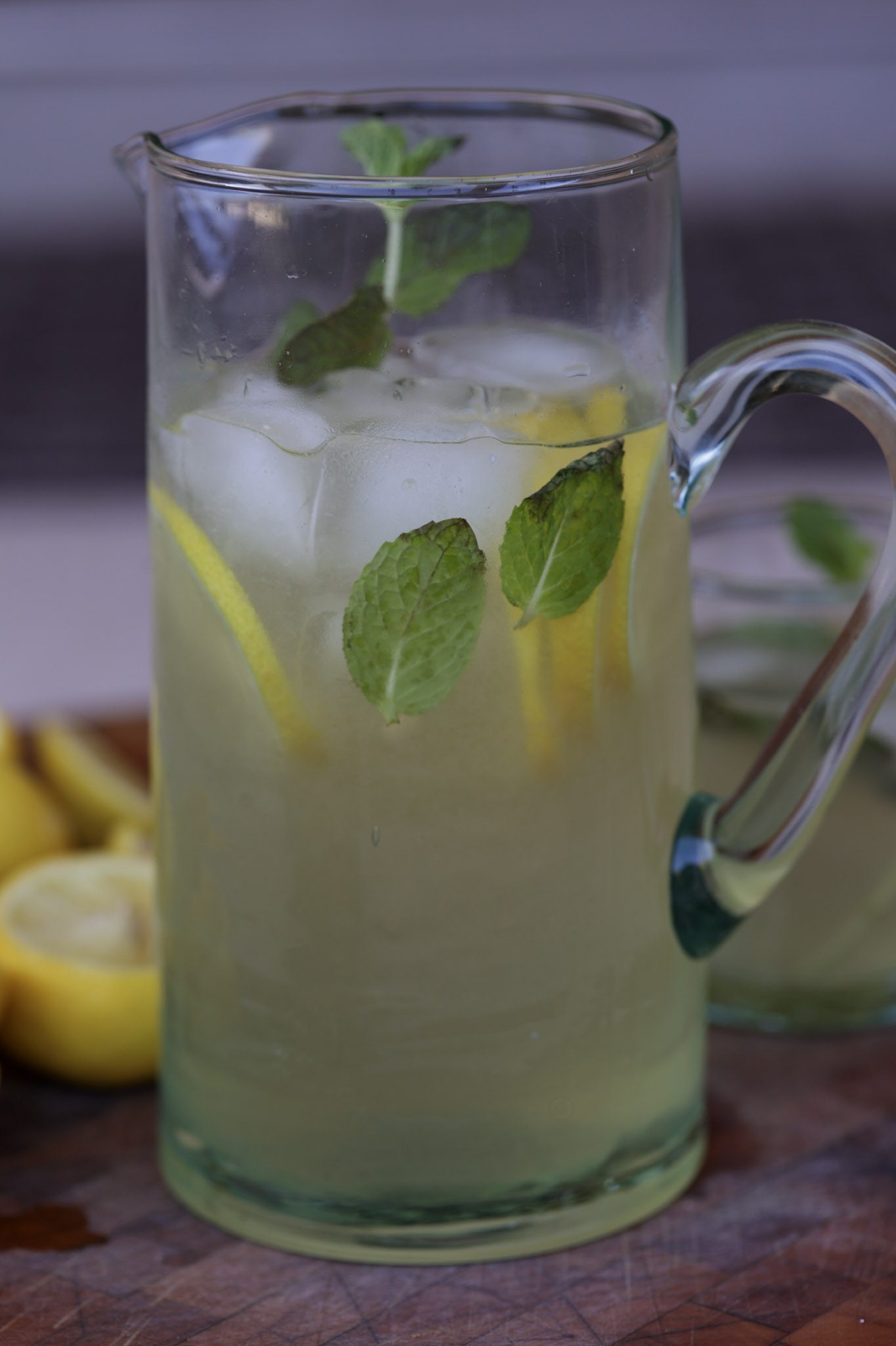 Haitian lemonade with fresh mint in a pitcher