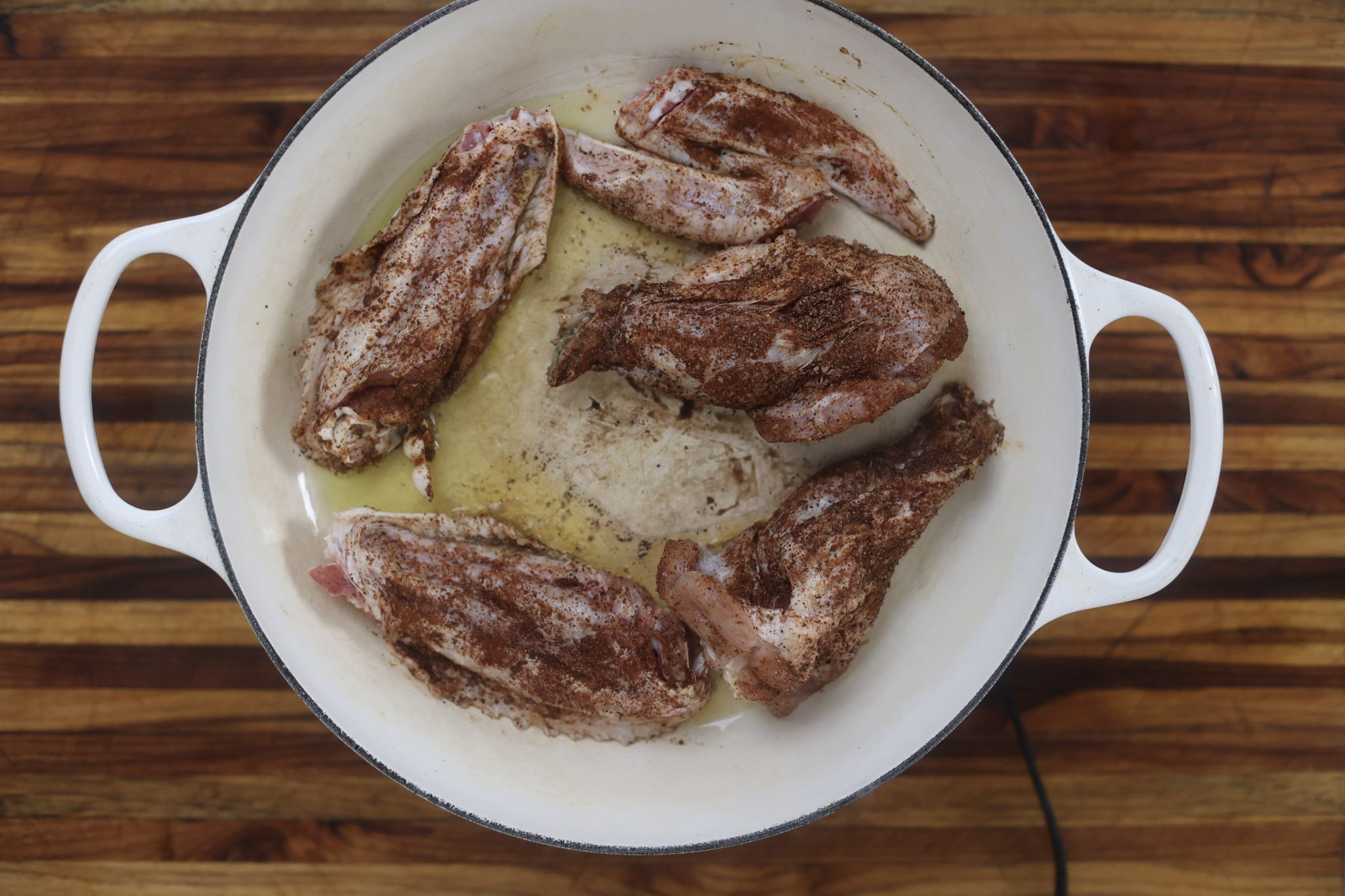 turkey wings browning in skillet