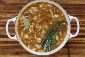 braising liquid in white pan