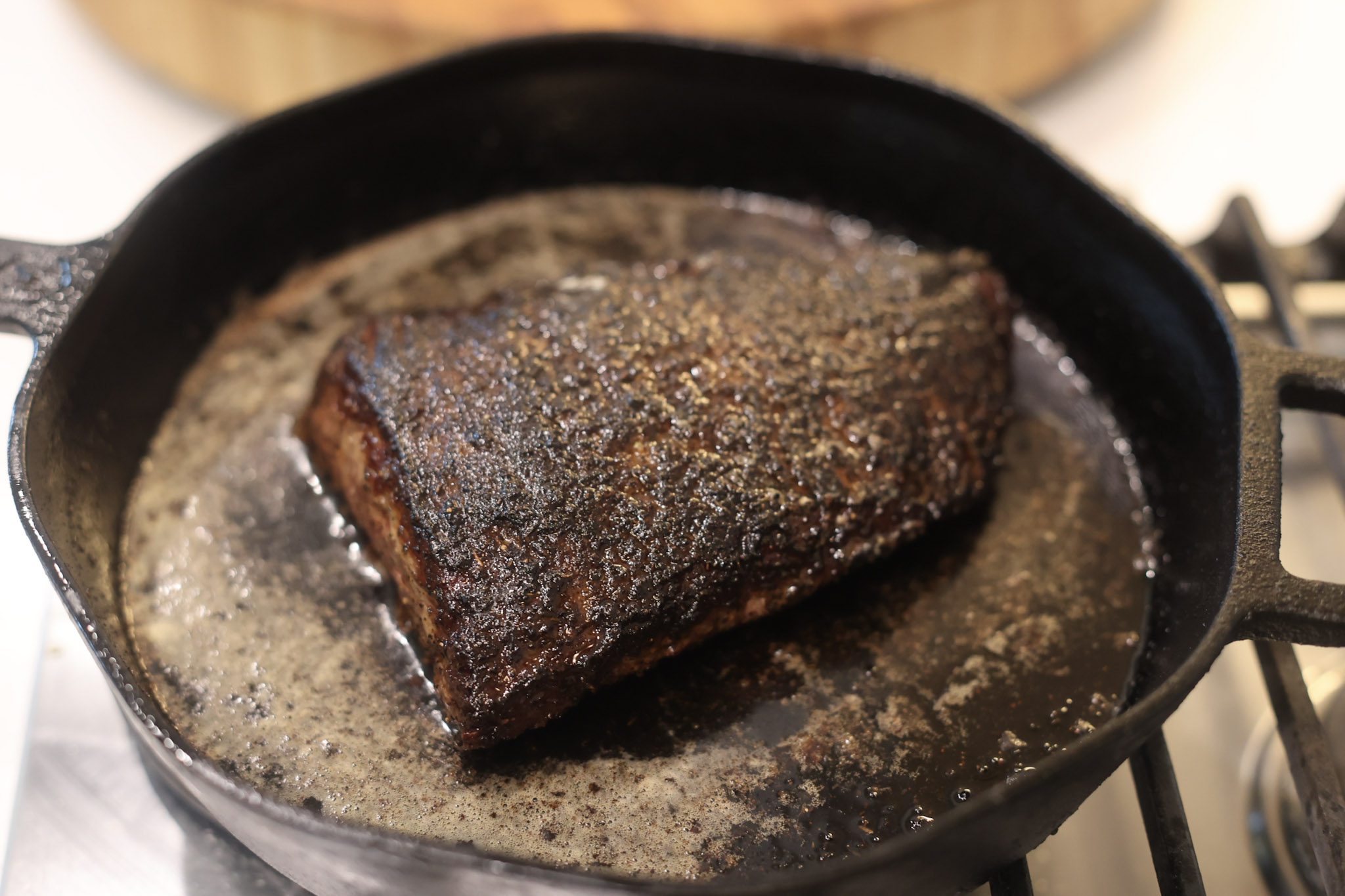 blackened bavette steak in cast iron skillet