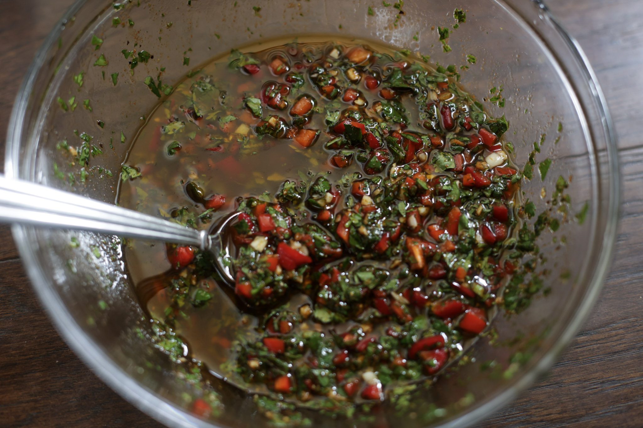 chimichurri sauce in glass bowl
