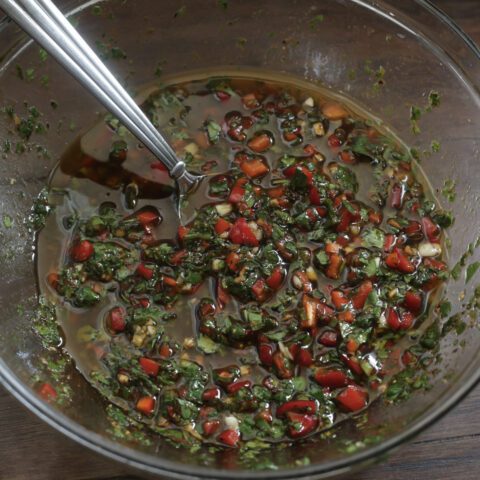 chimichurri sauce in glass bowl